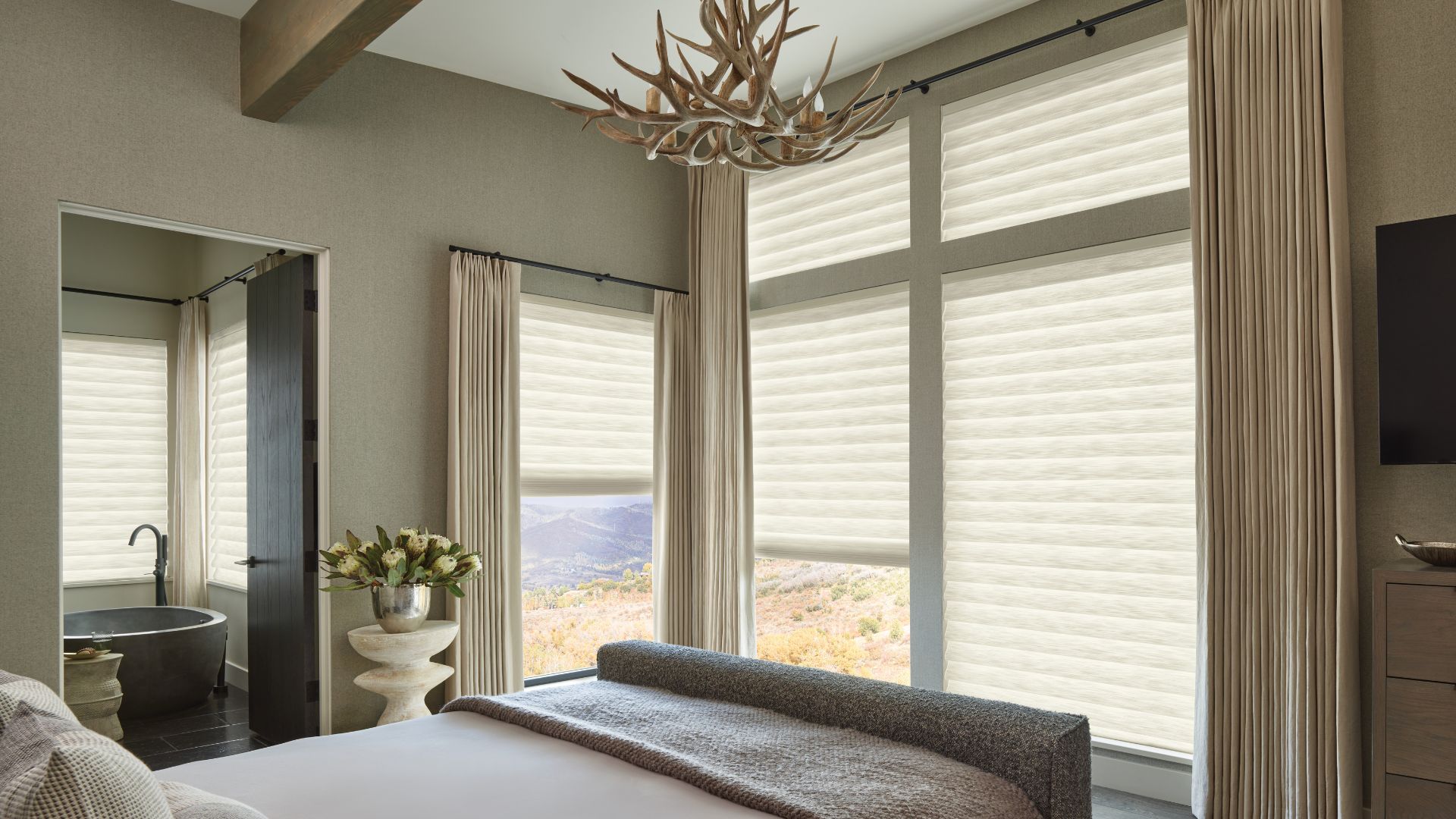 Hunter Douglas window treatments in a cozy bedroom